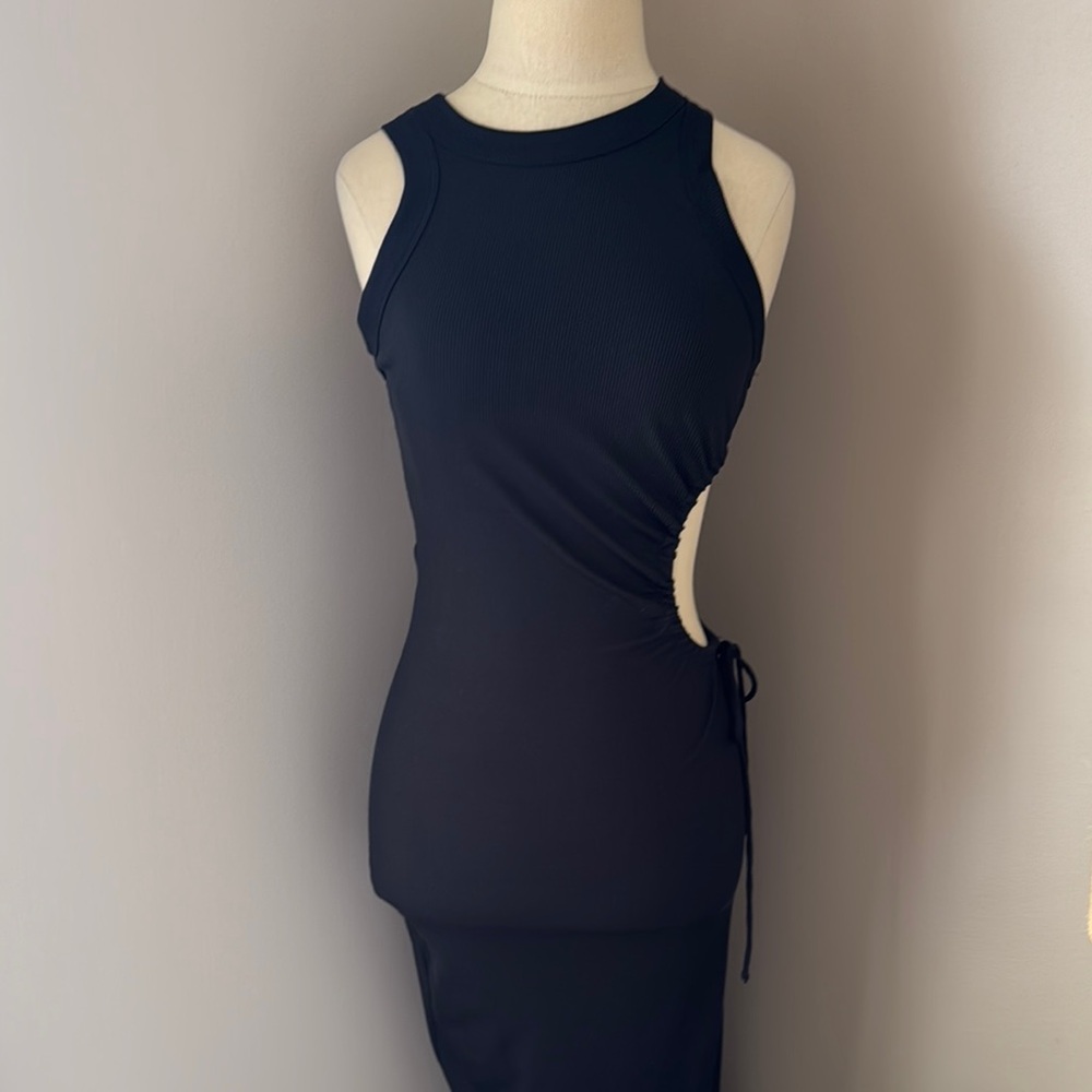 Beautiful black Keyhole dress elegant for a night out or can be worn casual.